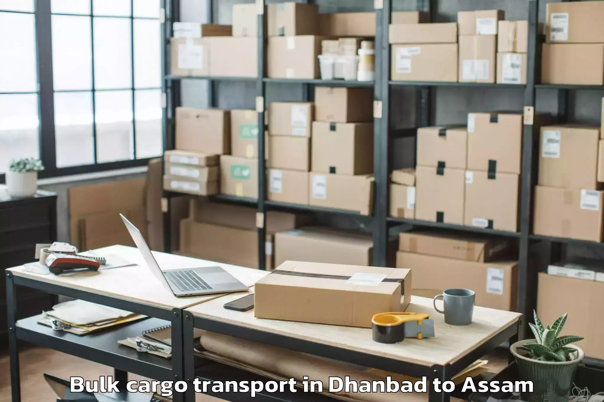 Trusted Dhanbad to Balijan Bulk Cargo Transport